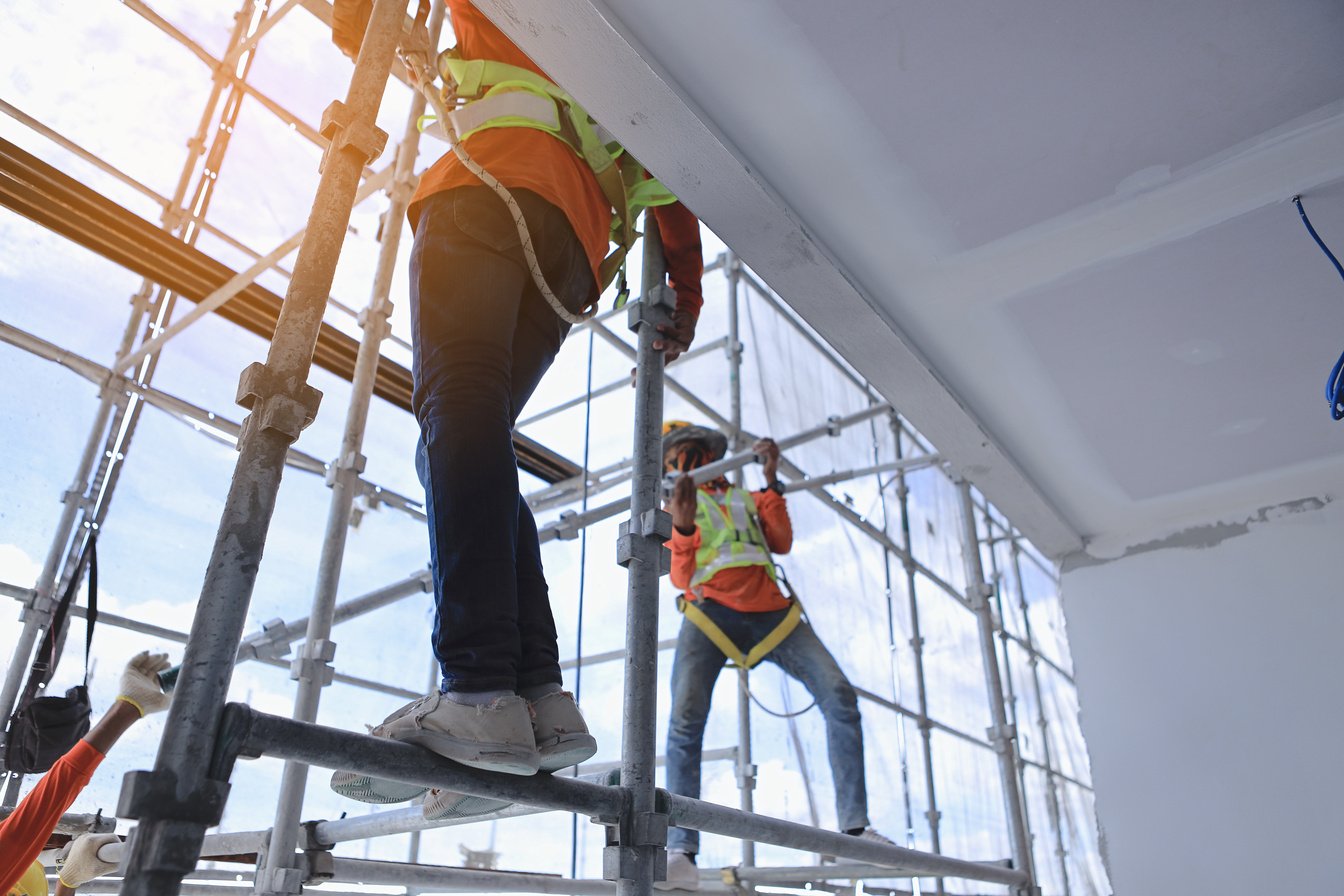 Construction Workers on a Scaffolding